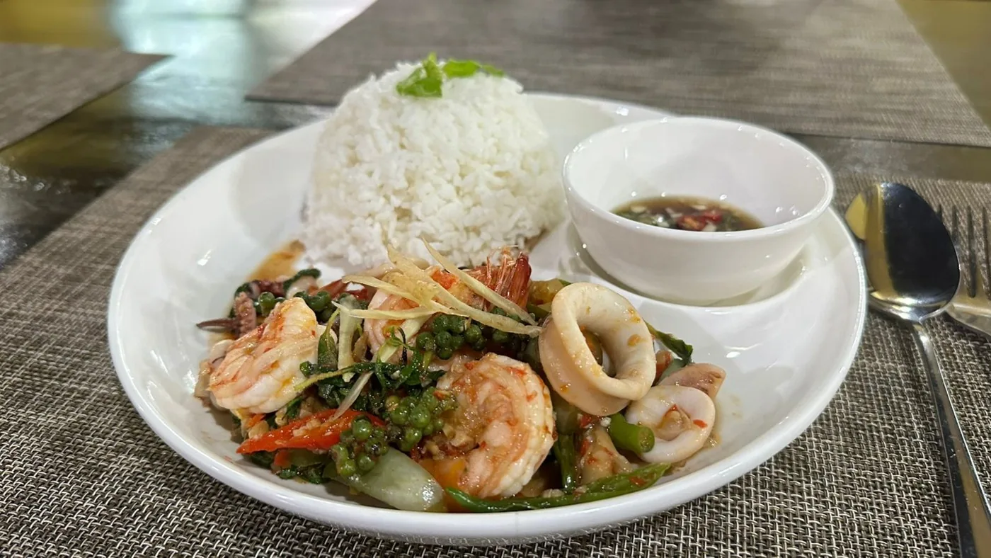 Spicy stir-fried seafood with rice